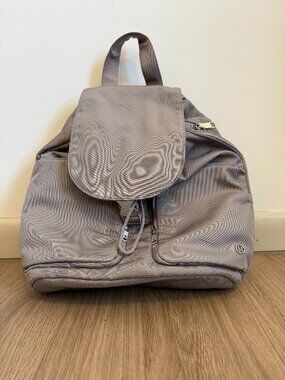 Lululemon Taupe Nylon Flap Drawstring Backpack Dual Zip Pockets EUC